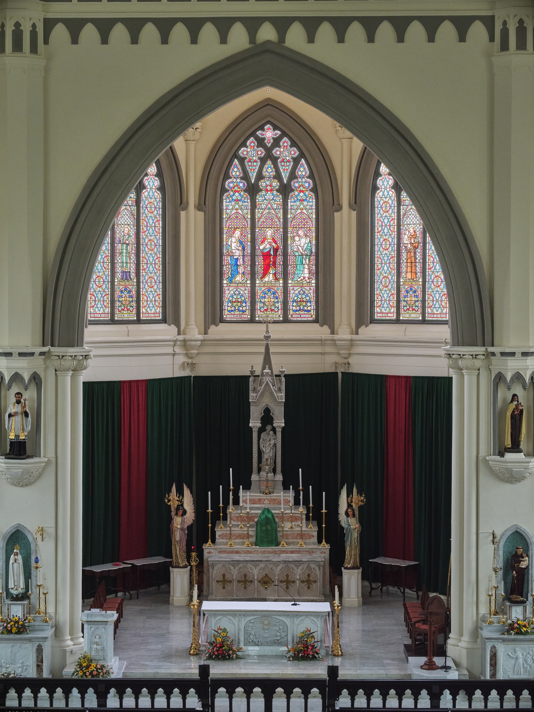 Cleaned and restored, the intricate stained glass panels above the main altar is a window to the past 