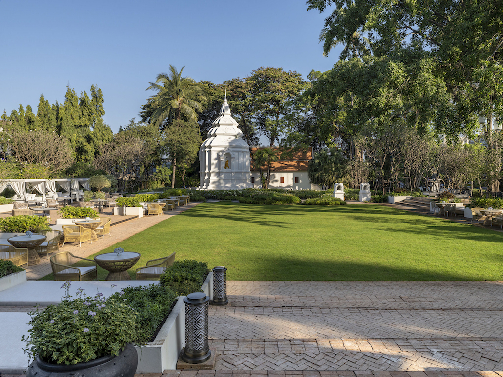 The hotel’s lush lawn overlooks Wat Chang Khong, the 600-year-old Buddhist stupa.