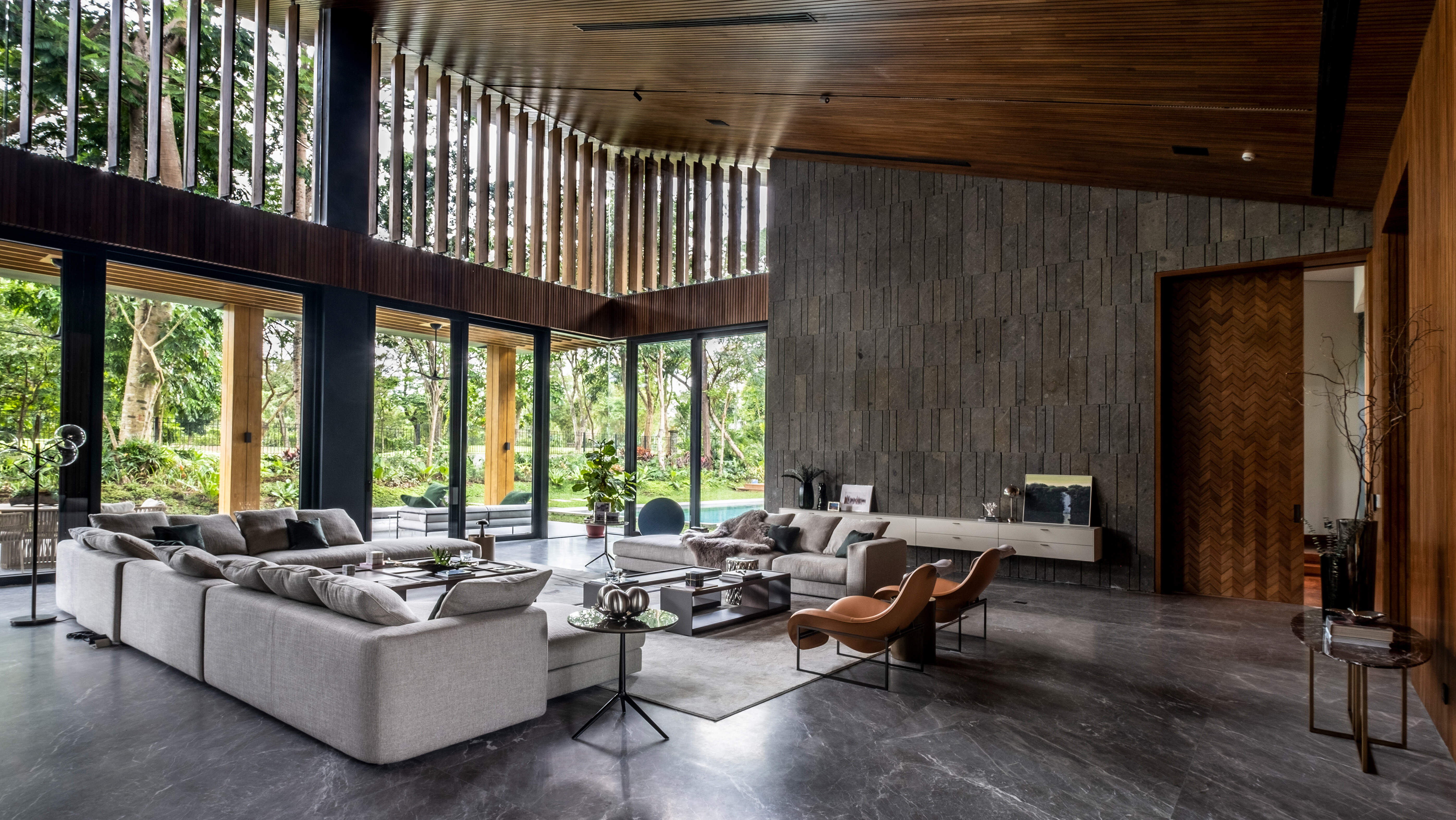 The expansive views from the main living room demonstrate the connection between the indoor and the outdoor