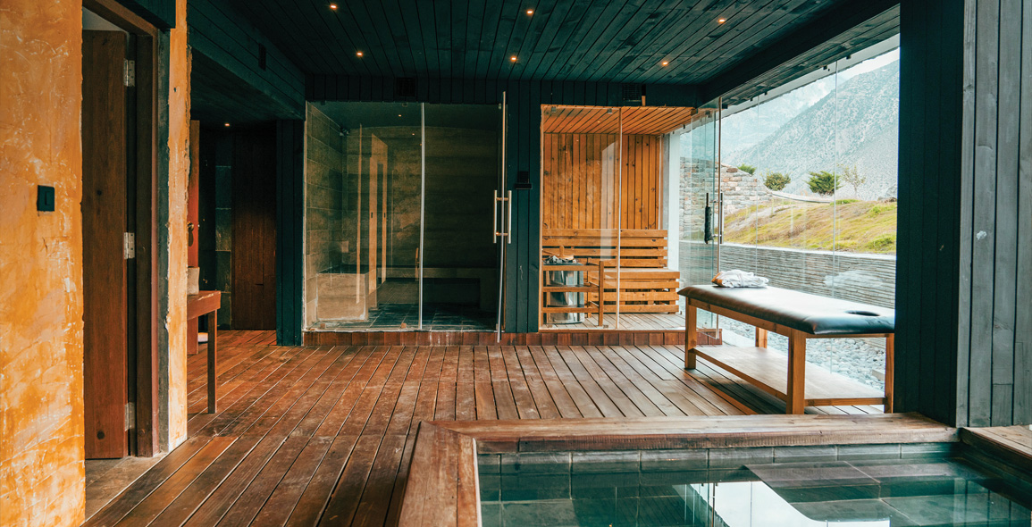 The spa includes a stone jacuzzi, steam room, and sauna.